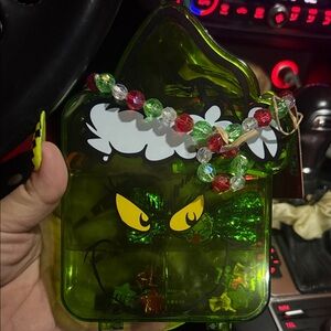 Grinch-Shaped Box with Beaded Bracelet with hair accessories